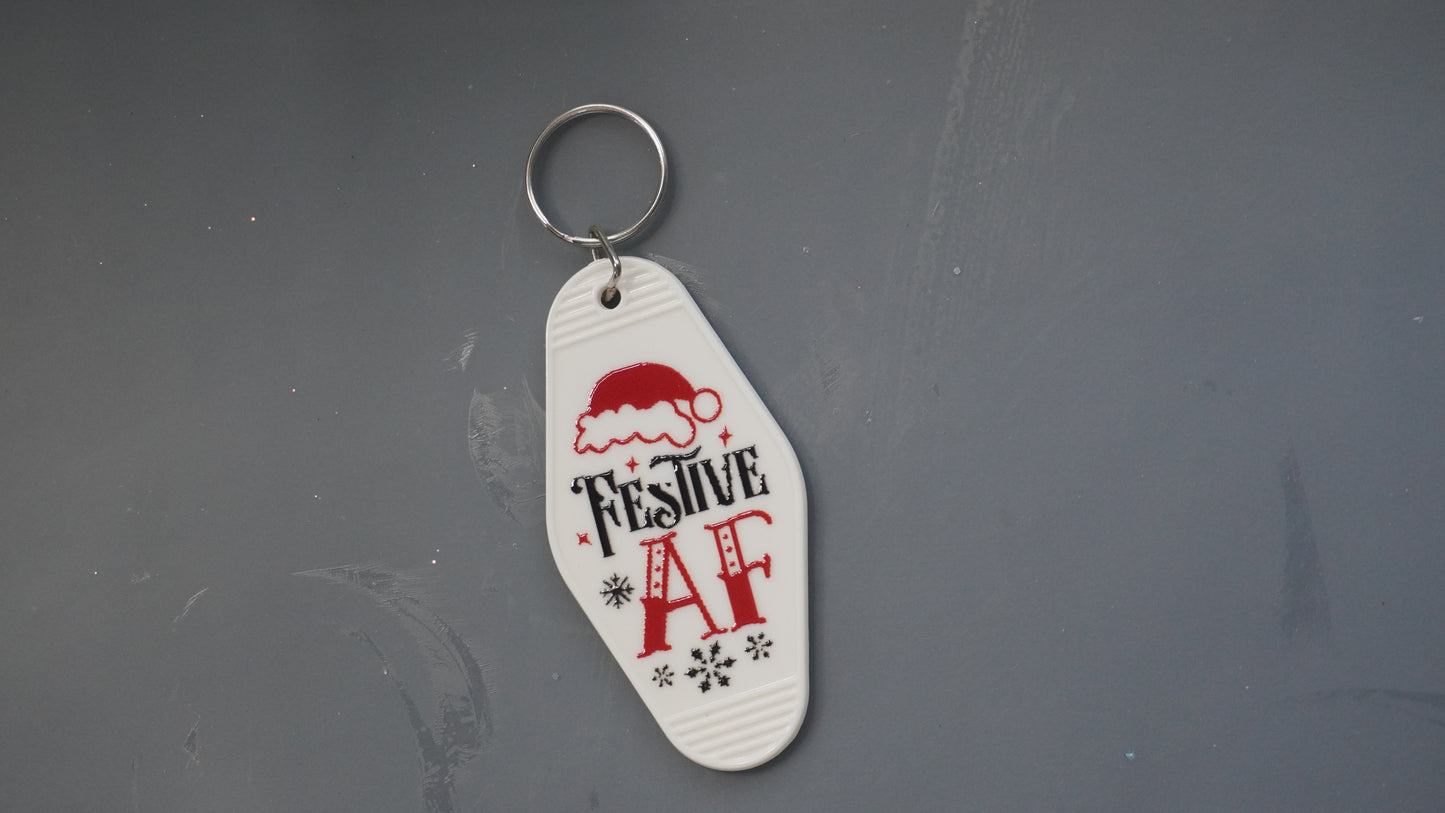Sassy Christmas Motel Keychains – Holiday Humor with Attitude