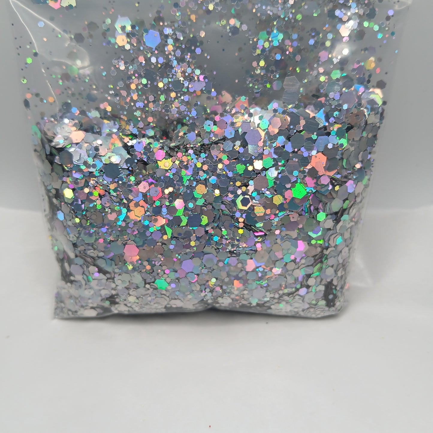 Silver Bell Holographic Glitter – Radiant Chunky Silver Glitter