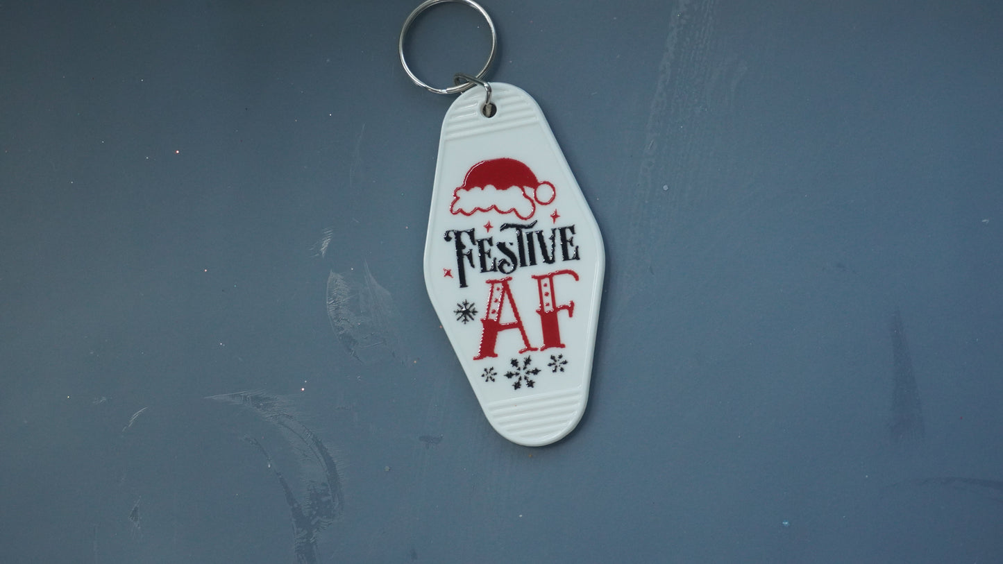 Sassy Christmas Motel Keychains – Holiday Humor with Attitude