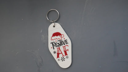 Sassy Christmas Motel Keychains – Holiday Humor with Attitude