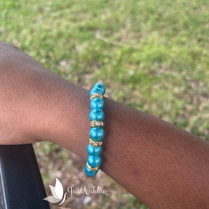 Sapphire Glimmer Bracelet | Blue Pearl Beaded Stretch Bracelet with Gold Rhinestone Accents