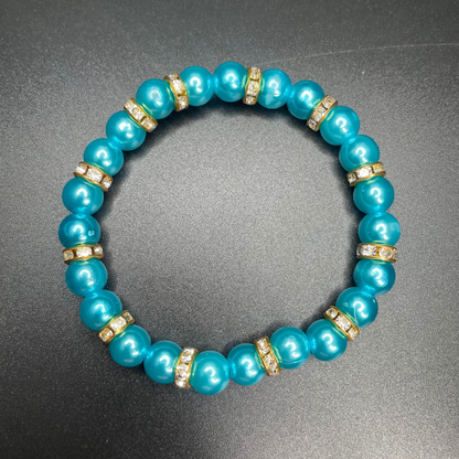 Sapphire Glimmer Bracelet | Blue Pearl Beaded Stretch Bracelet with Gold Rhinestone Accents
